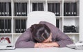 Tired business woman sleeping in office. Overwork concept Royalty Free Stock Photo