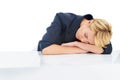 Tired, business woman and sleeping in studio with burnout, stress and low energy at table on white background. Fatigue