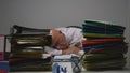 Tired Businessman in Accounting Archive Sleeping at Work