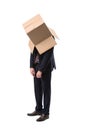 Tired businessman with box on head Royalty Free Stock Photo