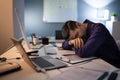 Tired Businessman Sleeping While Calculating Expenses In Office Royalty Free Stock Photo