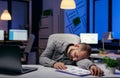 Tired businessman sleeping in his workplace Royalty Free Stock Photo