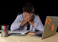 Tired businessman suffering work stress wasted worried busy in office late at night with laptop computer Royalty Free Stock Photo