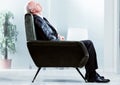 Tired businessman taking a moment to relax Royalty Free Stock Photo