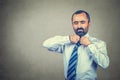 Tired businessman taking off his tie off Royalty Free Stock Photo