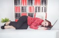 Tired businesswoman sleeping on the table Royalty Free Stock Photo