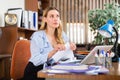 Upset female employee manager at working place Royalty Free Stock Photo