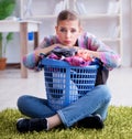 Tired depressed housewife doing laundry Royalty Free Stock Photo