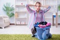 The tired depressed housewife doing laundry Royalty Free Stock Photo