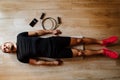 Tired and drained athlete lays on floor Royalty Free Stock Photo