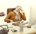 Tired entrepreneur sleeping at his desk, overworked from working late Royalty Free Stock Photo