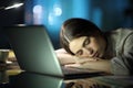 Tired entrepreneur sleeping over laptop late hours in the night Royalty Free Stock Photo