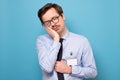 Tired and exhausted guy looking unsatisfied and tired after hard working day Royalty Free Stock Photo