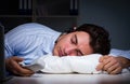 Tired and exhausted helpdesk operator during night shift Royalty Free Stock Photo