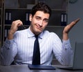 Tired and exhausted helpdesk operator during night shift Royalty Free Stock Photo