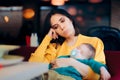 Tired Exhausted Mother Holding Sleeping Baby