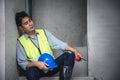 Tired exhausted and napping engineer builder worker in construction site Royalty Free Stock Photo