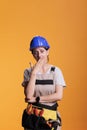 Tired exhausted woman constructor yawning