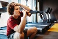 Tired fat man thinking over weight problems, desire to lose weight, gym workout Royalty Free Stock Photo