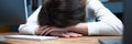 Tired female employee at office workplace taking nap Royalty Free Stock Photo