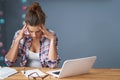 Tired female student learning till late at home Royalty Free Stock Photo