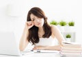 Tired female student studying with laptop Royalty Free Stock Photo