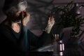 Tired and frustration elderly woman working and using laptop at late night Royalty Free Stock Photo