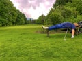 Tired Golfer Sleeping on a Bench on Golf Course Royalty Free Stock Photo