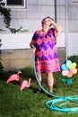 Tired granny doing yard work Royalty Free Stock Photo