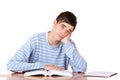 Tired handsome male student reading study books Royalty Free Stock Photo