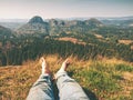 Tired hikers legs without shoes. Traveler relaxing