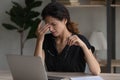 Tired latin woman office employee rub nose take spectacles off