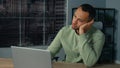 Tired lazy young african american businessman bored at work fall asleep at office desk sleepy overworked ethnic man Royalty Free Stock Photo