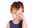 A tired little boy rubbing eyes Royalty Free Stock Photo