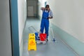 Tired Male Janitor Royalty Free Stock Photo