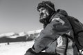 Tired man with beard resting during the climbing Royalty Free Stock Photo