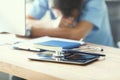 Tired man doctor sleeps lying on his hands while sitting at a computer desk. Doctor works on a computer in the clinic Royalty Free Stock Photo