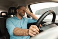 Tired Man Sitting In Car Stuck In Traffic Jam Royalty Free Stock Photo