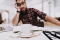 Tired Man. Sitting at Table. Coffee. Young Male Royalty Free Stock Photo