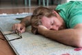 Tired man taking a nap at home from work Royalty Free Stock Photo