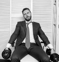 Tired man working hard. should work for success. challenging himself. businessman hold dumbbell. sport and business