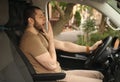 Tired man yawning while driving his car Royalty Free Stock Photo