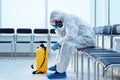 tired medical orderly in a biohazard suit. Royalty Free Stock Photo