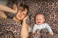 Tired mother can`t to sleep because her baby is crying Royalty Free Stock Photo