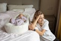 Tired Mother Suffering from experiencing postnatal depression. Health care mom motherhood stressful. Stay at home during Royalty Free Stock Photo