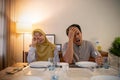 muslim couple having break fast or sahur in the morning