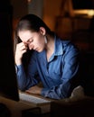 Tired, night and headache of woman at desk depression, burnout and mental health risk for project deadline or overworked Royalty Free Stock Photo