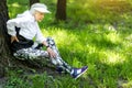 Tired old woman resting after strong training outdoors Royalty Free Stock Photo