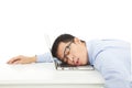 Tired overworked businessman sleeps on laptop Royalty Free Stock Photo