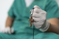 Tired praying doctor at the hospital. A doctor, a nurse who is thinking about treating a disease and a pandemic. Surgeon after Royalty Free Stock Photo